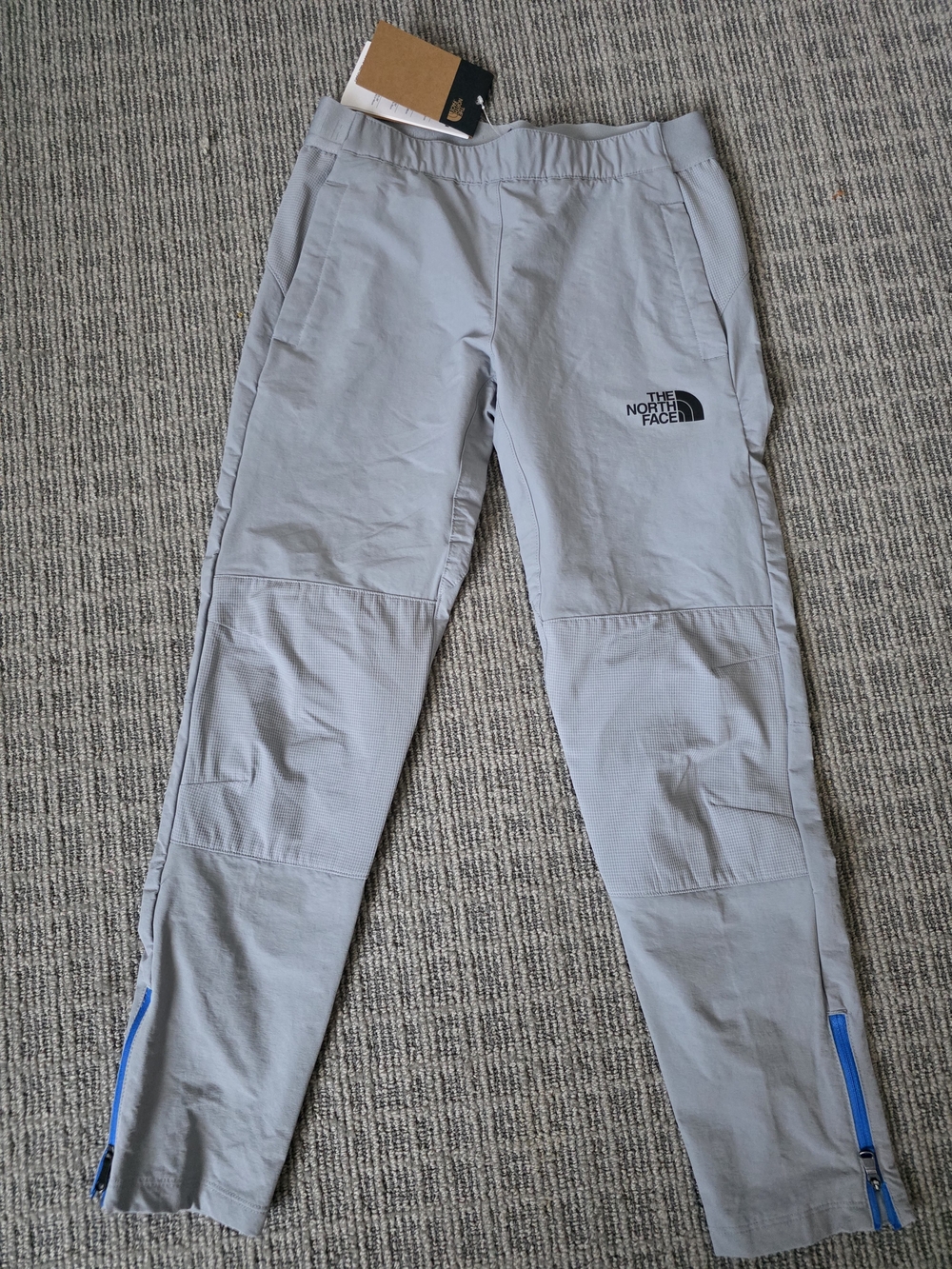 The North Face Light Gray Outdoor Pants with Blue Zippers
